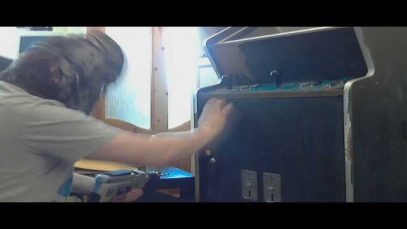 Let’s Get Retro!1980s Taito cab, drilling the coin door